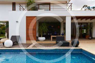 Endless pool design using bluestone with pool fence & fountain